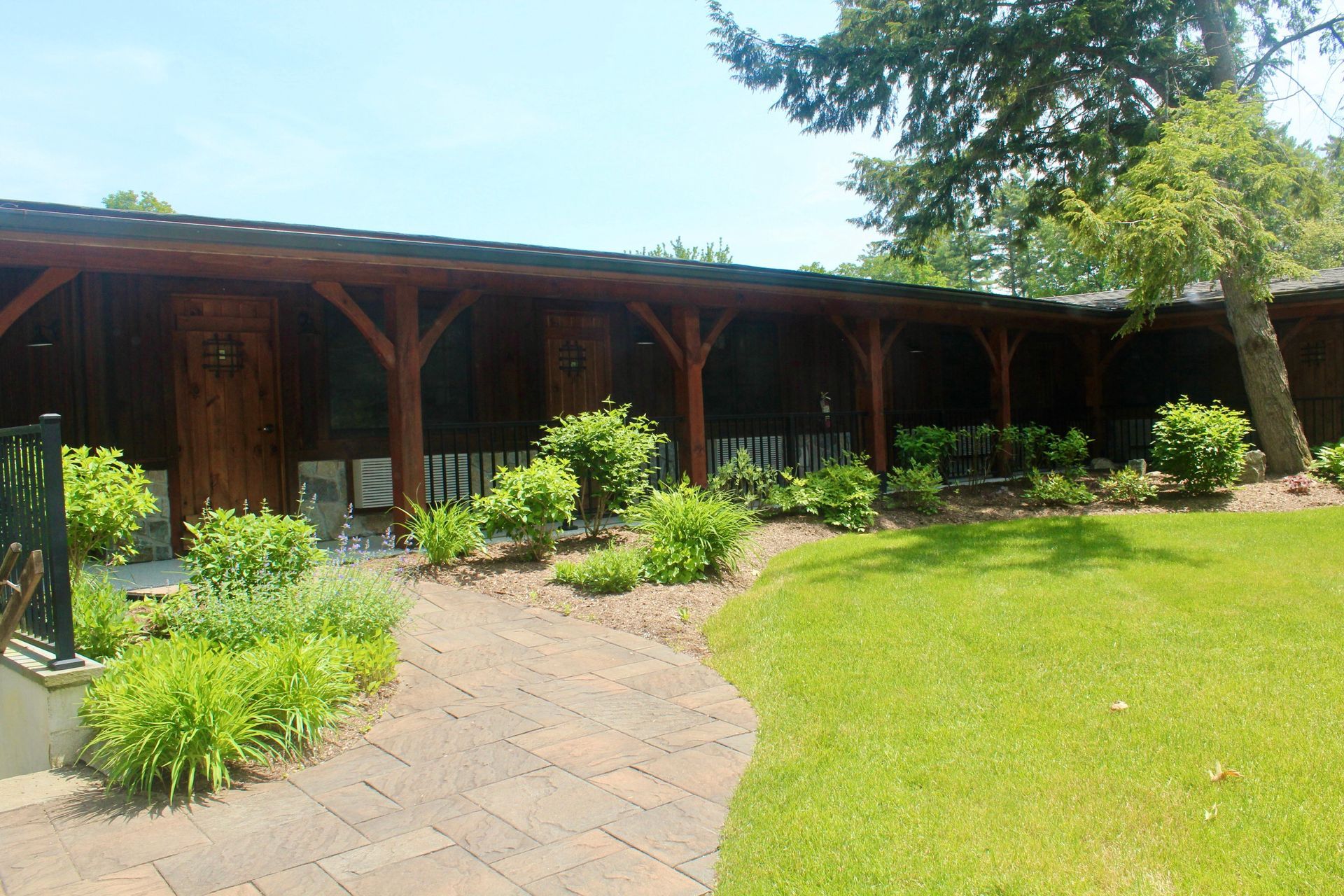 A house with a brick walkway leading to it