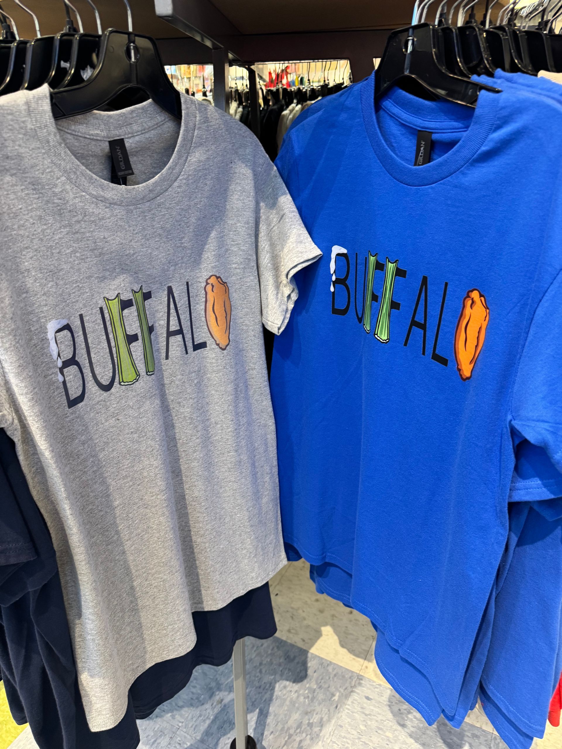 Two t-shirts: gray and blue, with 