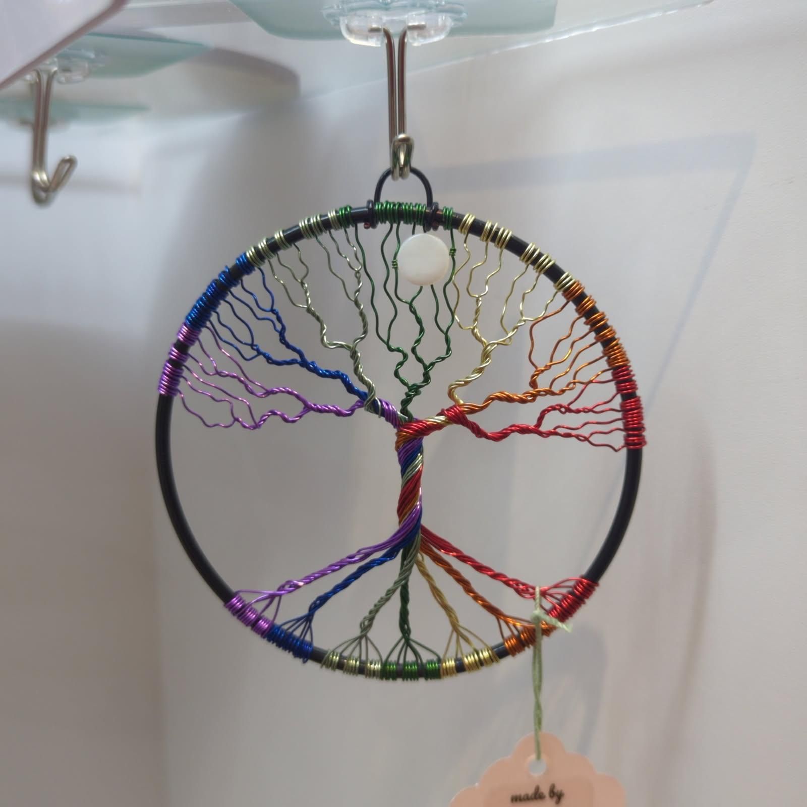 Rainbow wire tree of life hanging ornament.