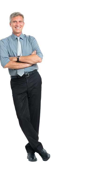 Man in a light blue shirt and tie, leaning against a surface, arms crossed, smiling.