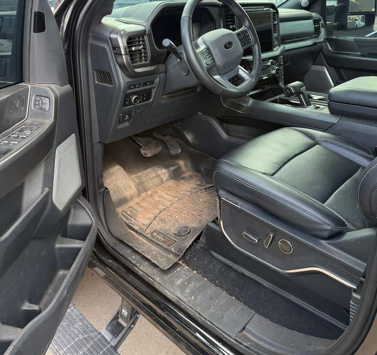 Stained car seats and dusty dashboard before interior car detailing Chandler AZ