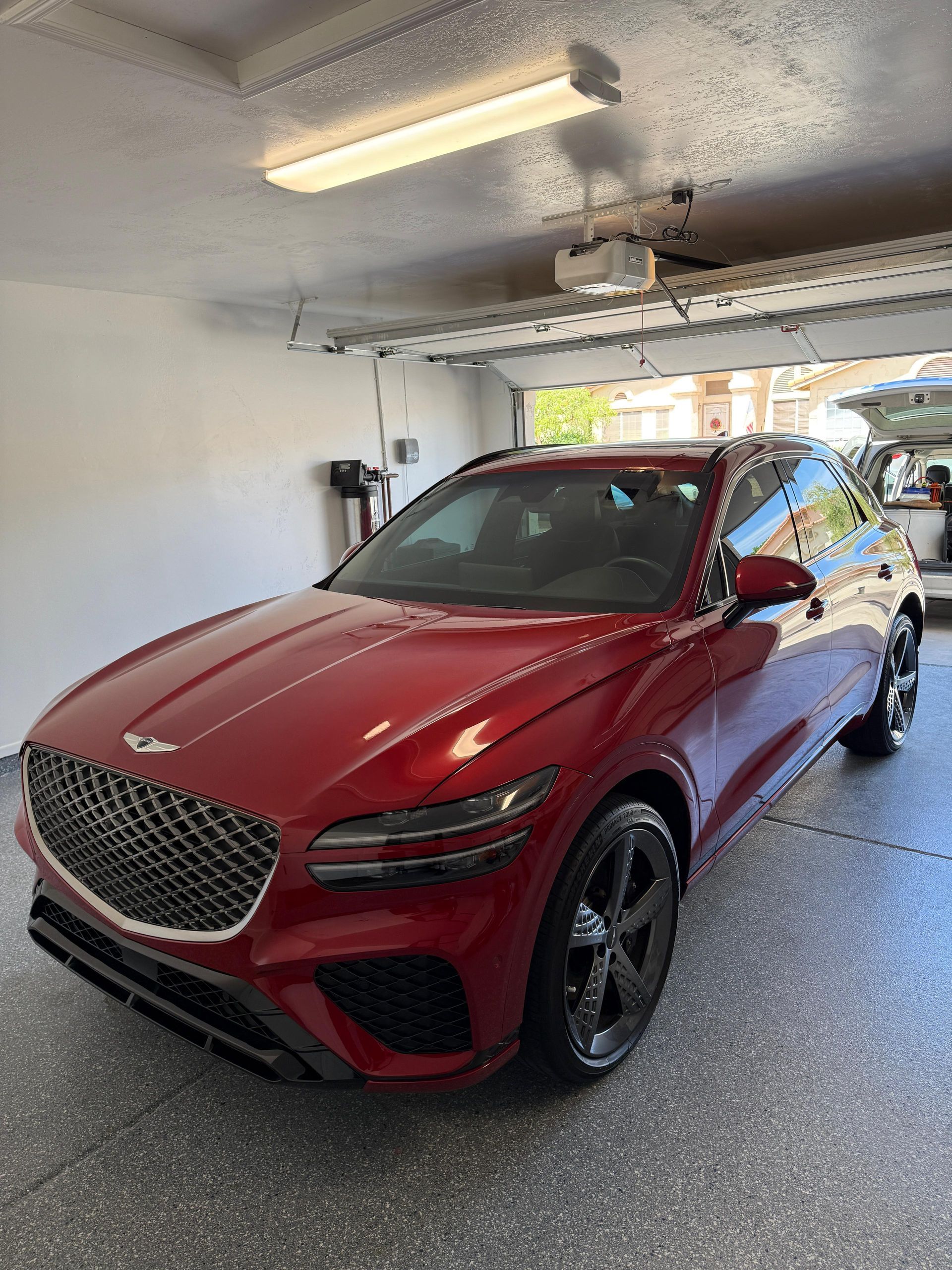 Mobile detailing service on a Genesis SUV in Chandler, Arizona by South Mountain Auto Detail.