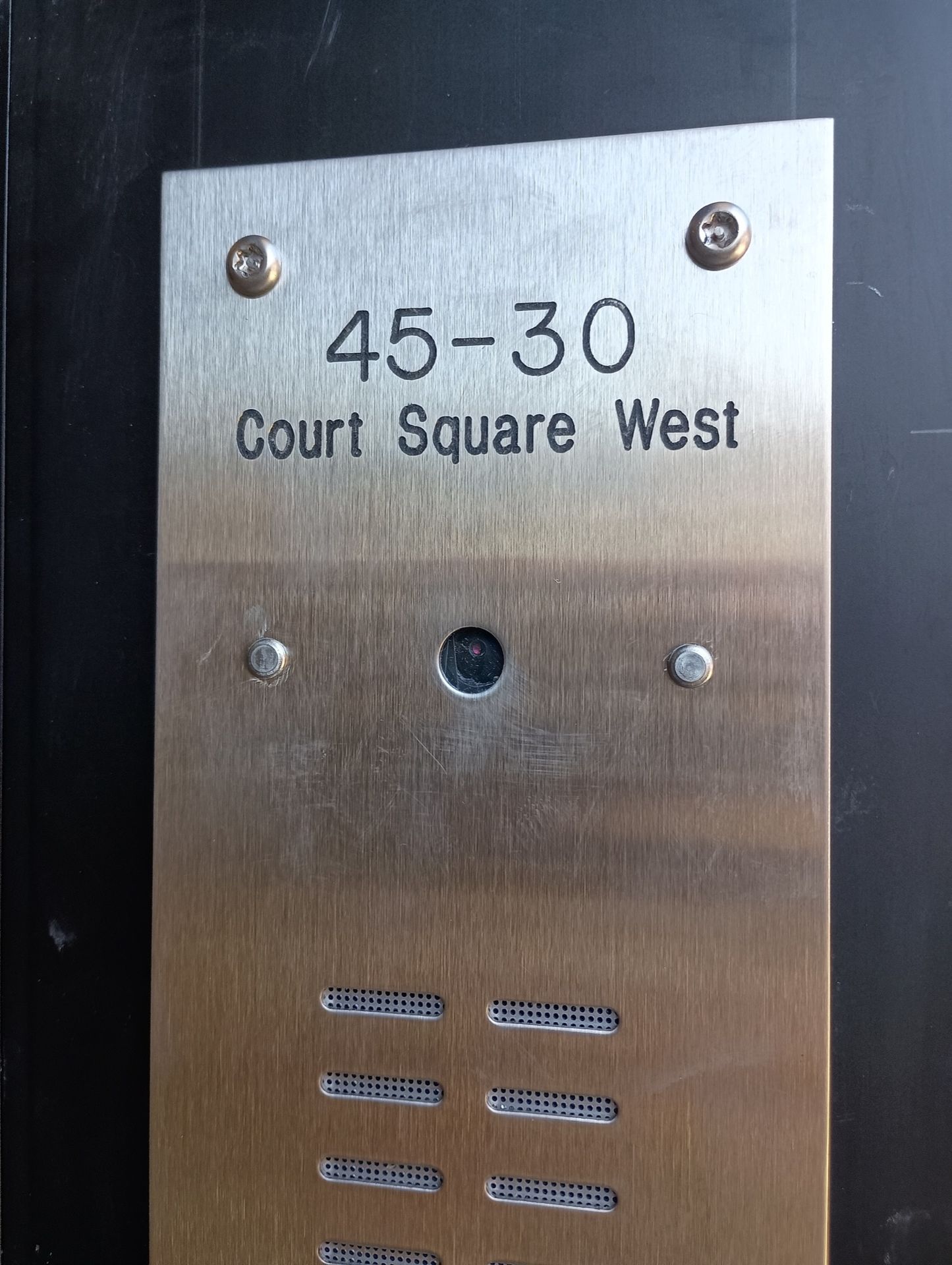 Newly installed access control system with a security camera at an apartment building in Long Island City, Queens 