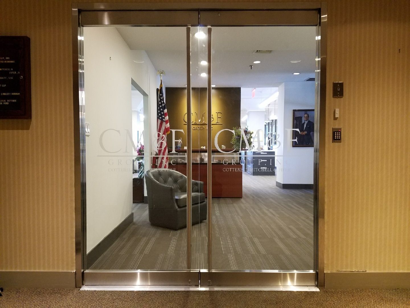 Custom Herculite frameless glass double doors installed at CM&F Group corporate office in Manhattan by Parker Custom Security
