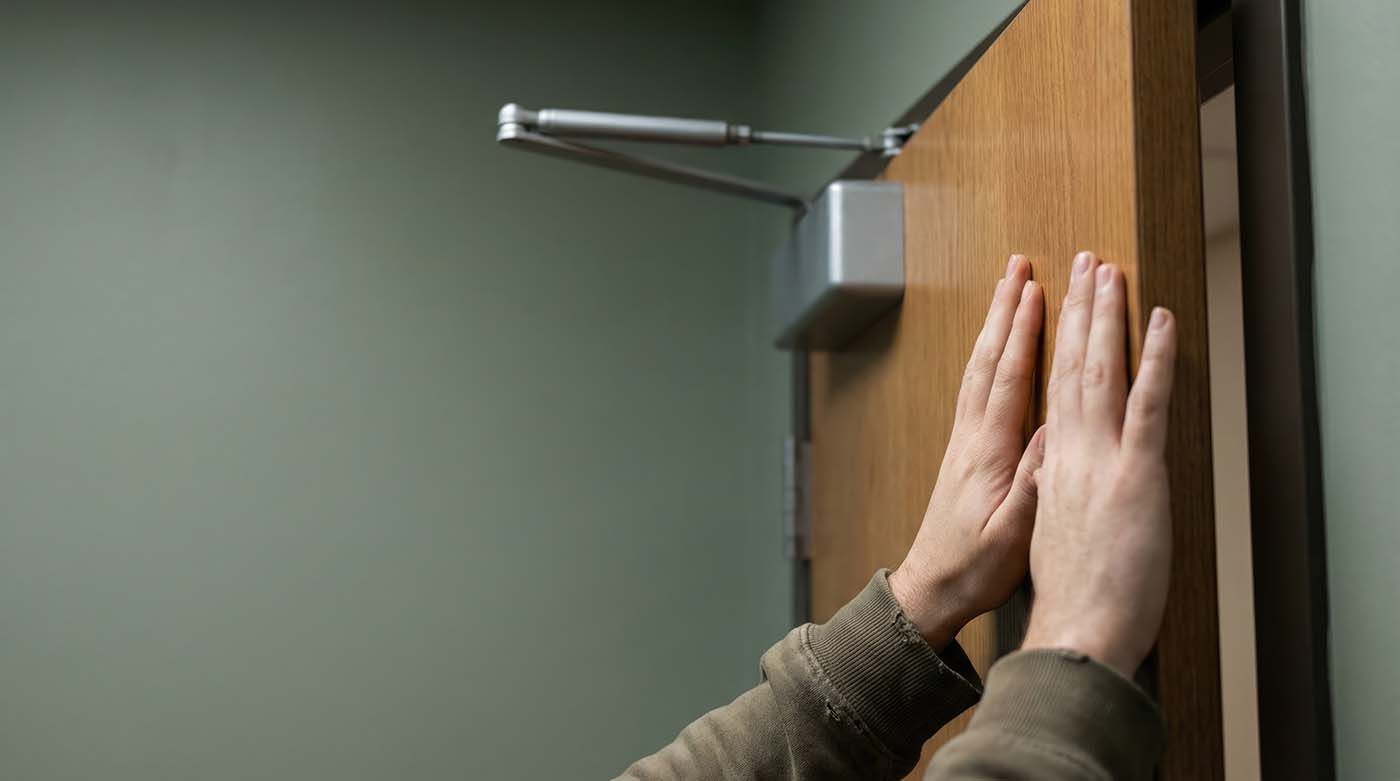 Door not closing properly at an office building in NYC