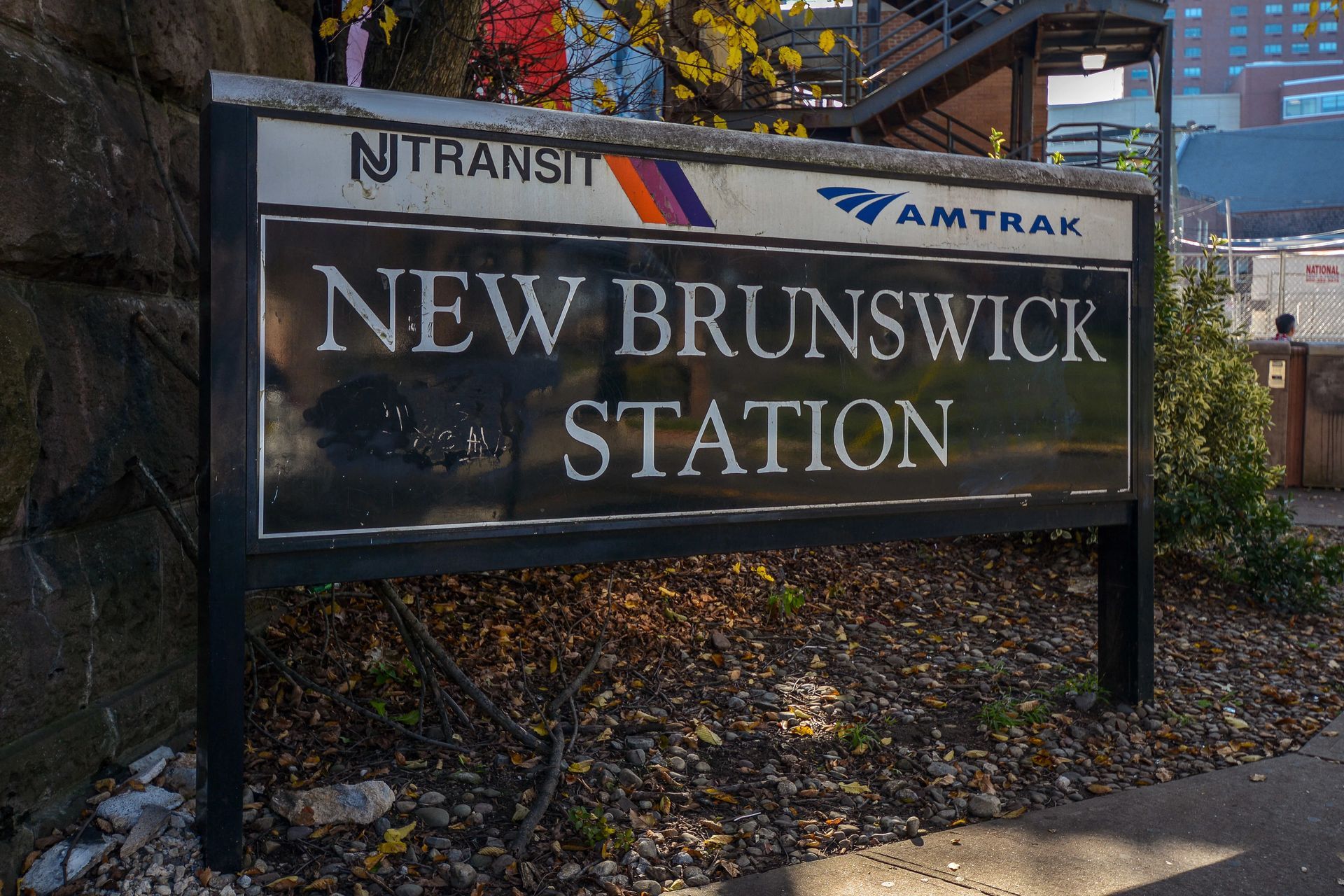 Sign for New Brunswick Station with NJ Transit and Amtrak logos. Visit our convenient downtown Brunswick location, where you're surrounded by shopping, dining, and local attractions. Start living better at The Brunswick apartments in downtown Brunswick, NJ. 