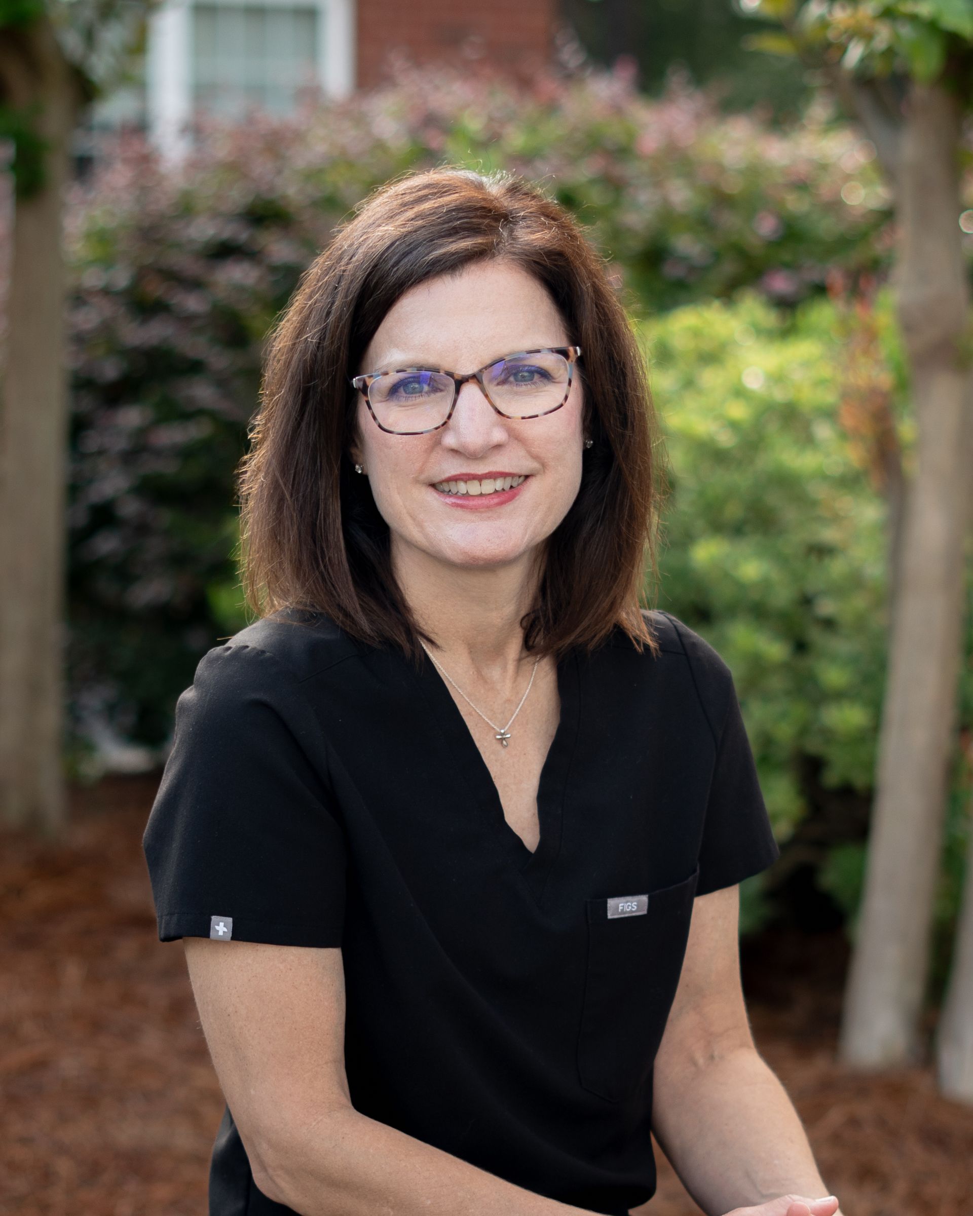 headshot of Dr. Lauri Bullen OB/GYN outdoors