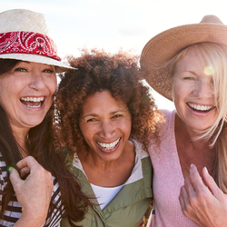 three diverse middle age women