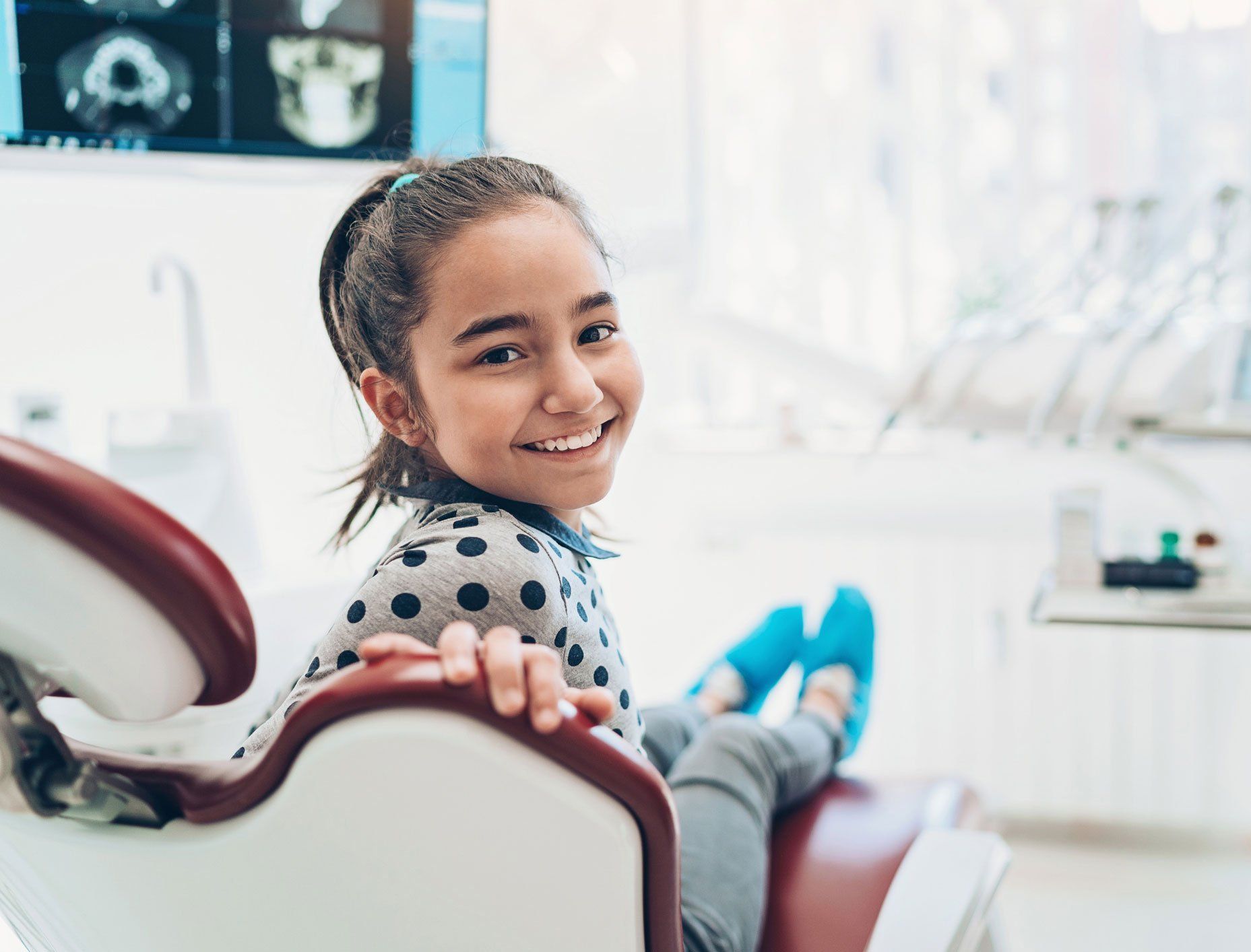 Kid smiling after the checkup — Rochester, MN — Broadway Dental Care