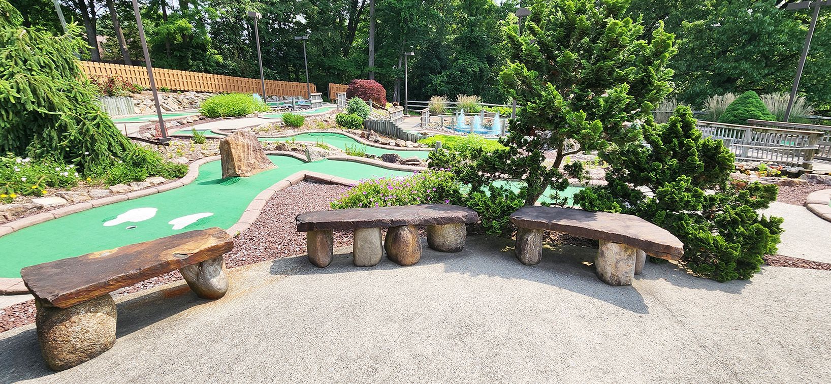 Golf course entrance with benches