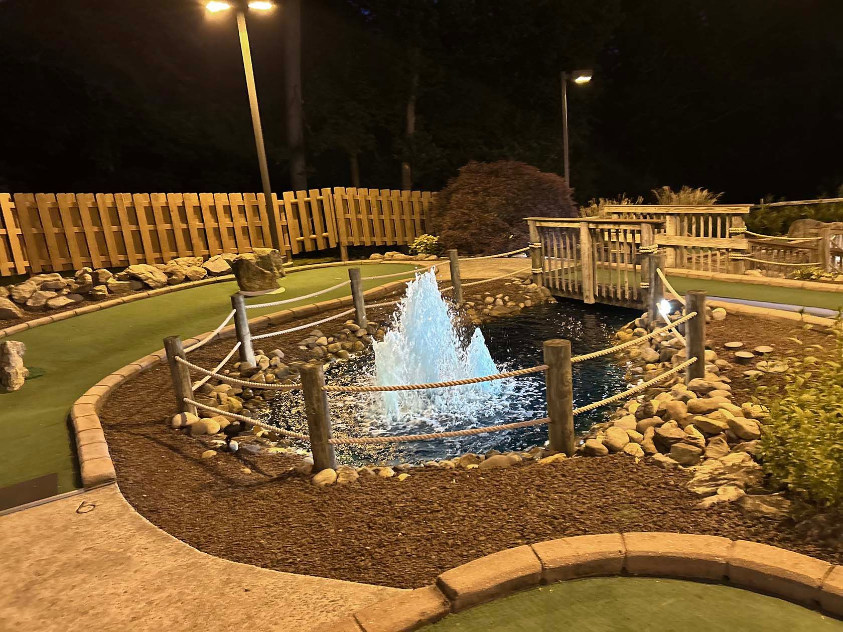 Golf course with water fountain