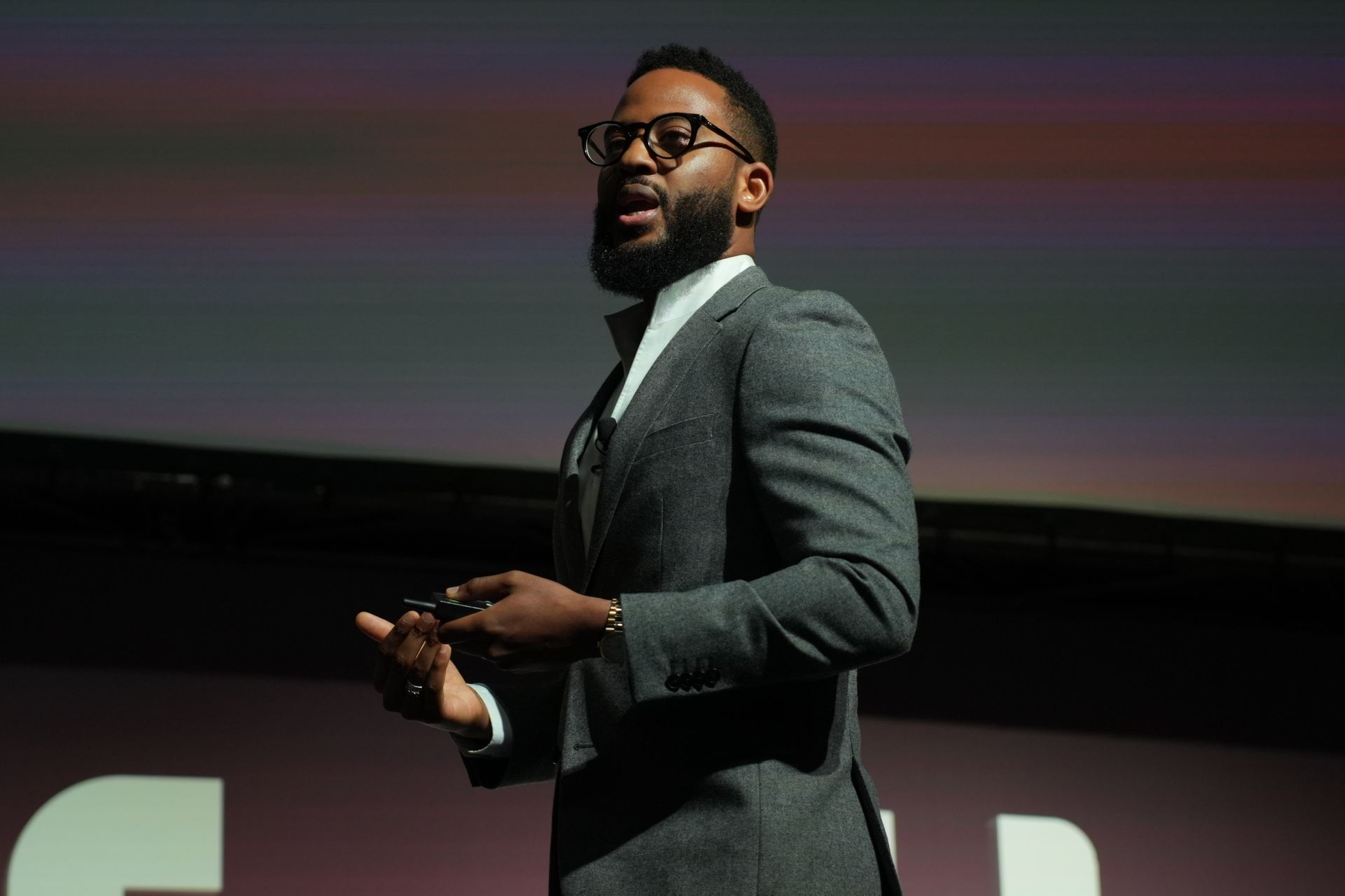 A group of people are looking at a computer screen.