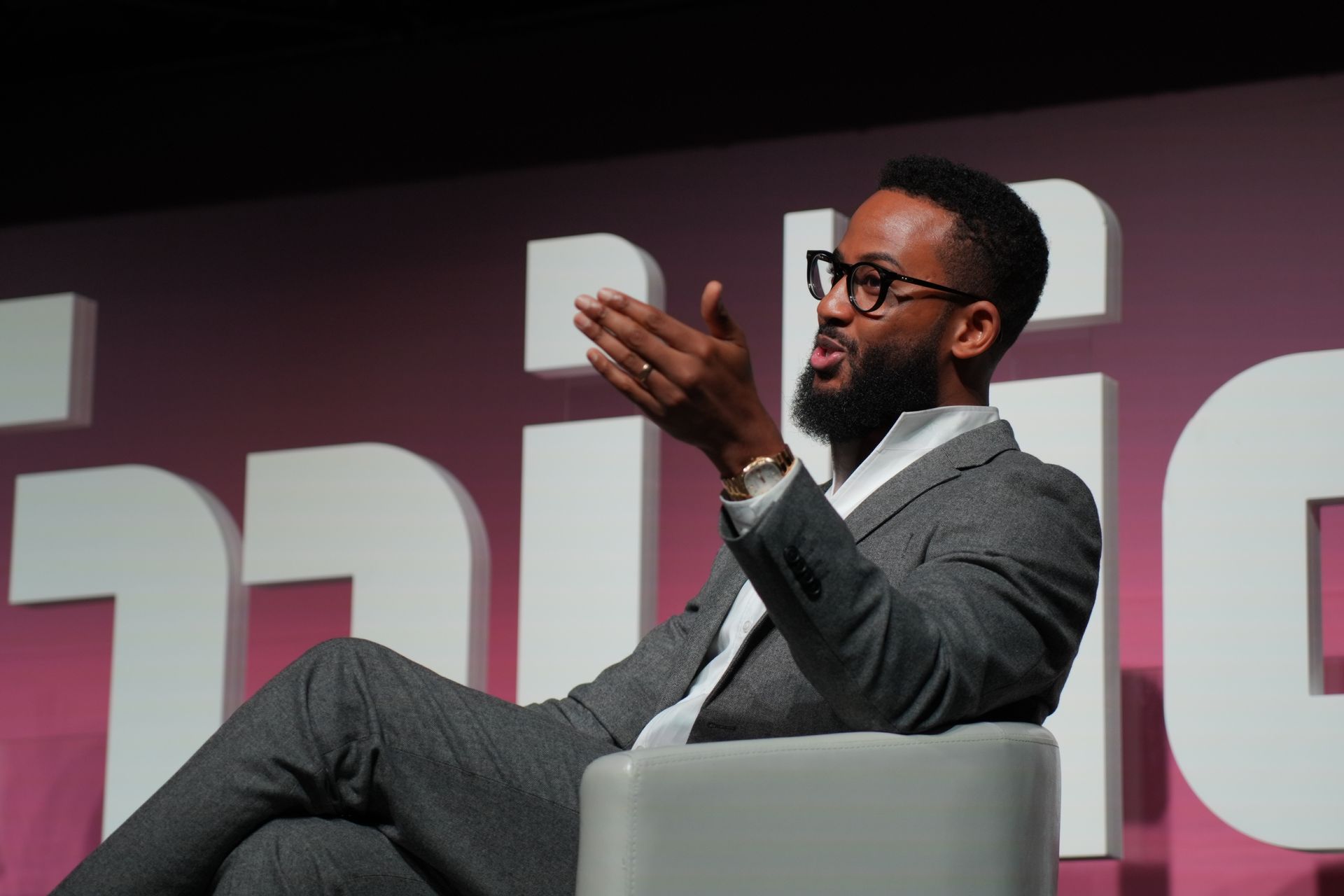 A double exposure of a woman 's face with a collage of pictures coming out of her head.