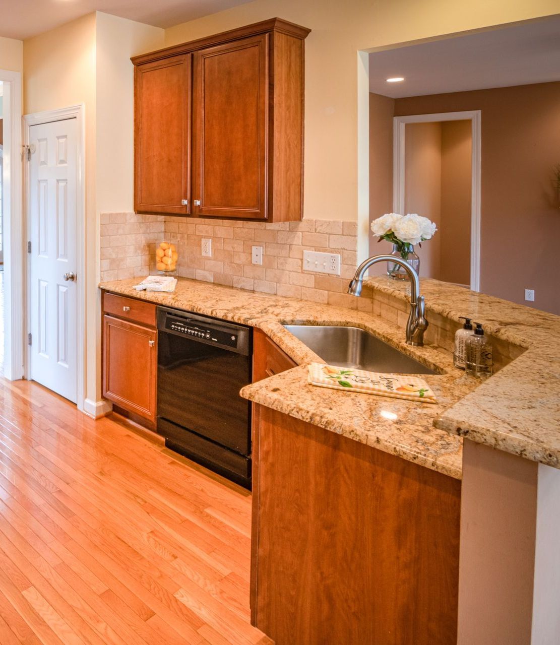 Recently completed plumbing installation with updated kitchen sink fixtures