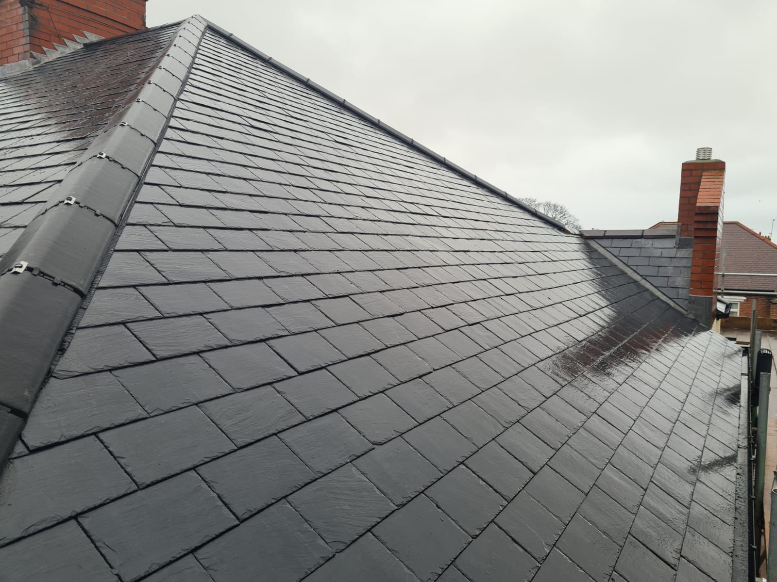 A roof with a lot of slate tiles on it
