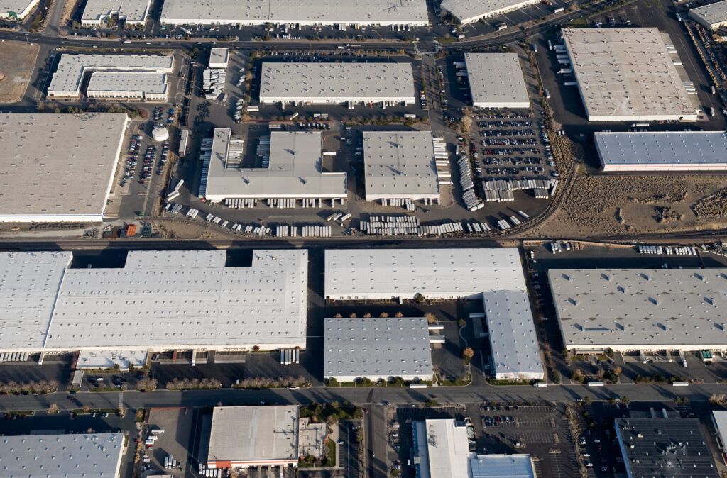 An aerial view of a large industrial area with lots of buildings