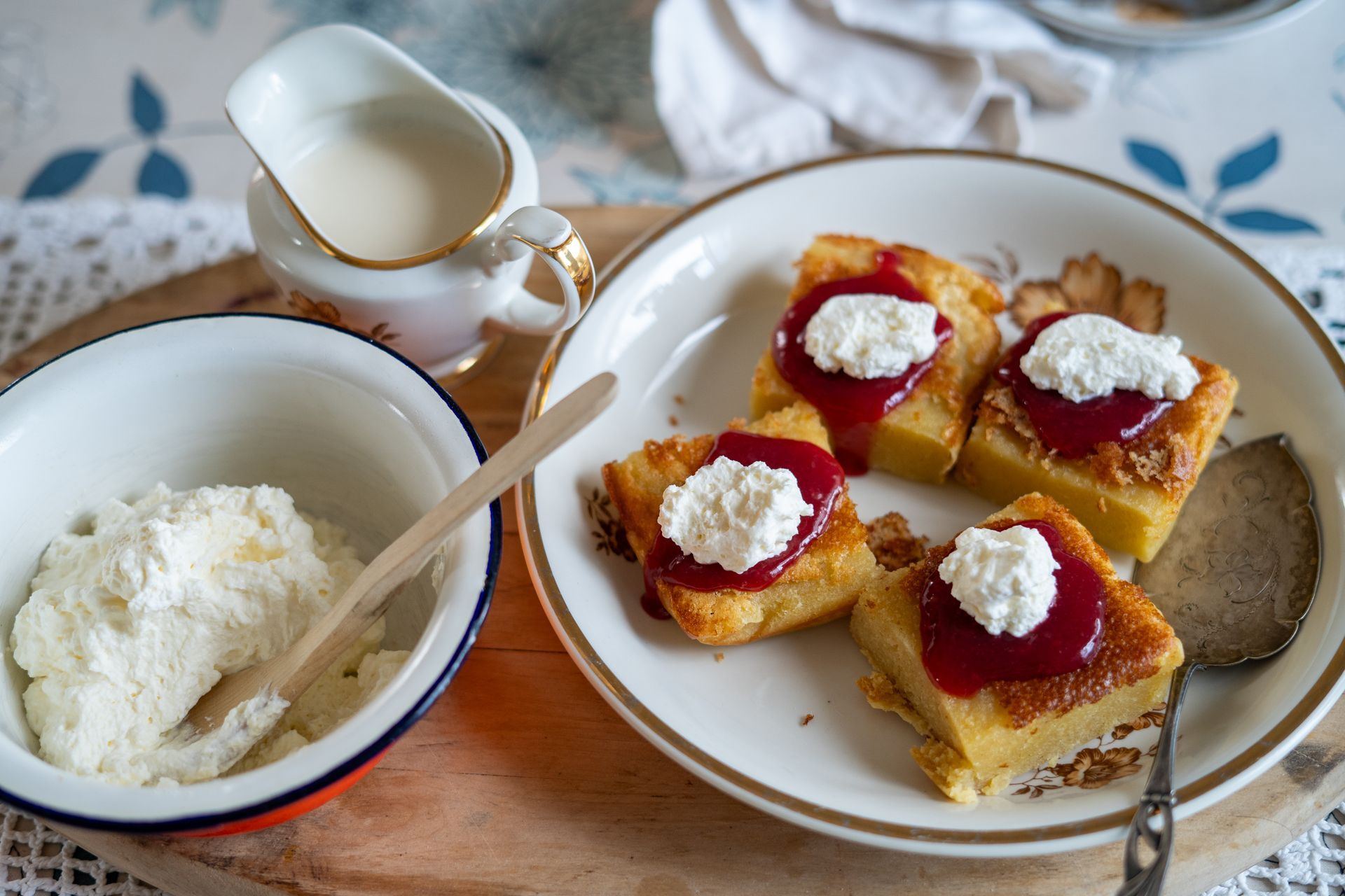 Traditional Finnish dessert tart with whipped cream and jam