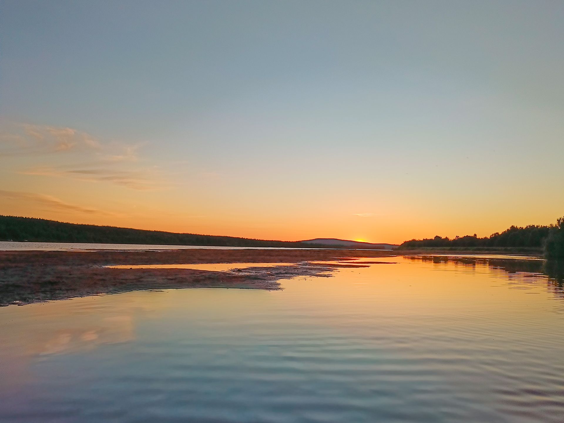 Midnight Sun in Ounasjoki Archipelago with sandy beaches