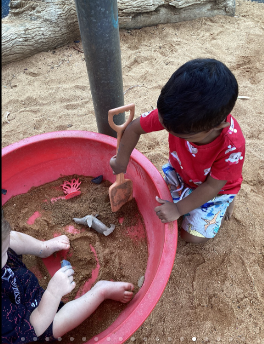 Two Children Playing In a Sand Boxβ Gap Community Early Learning Centre In The Gap, NT