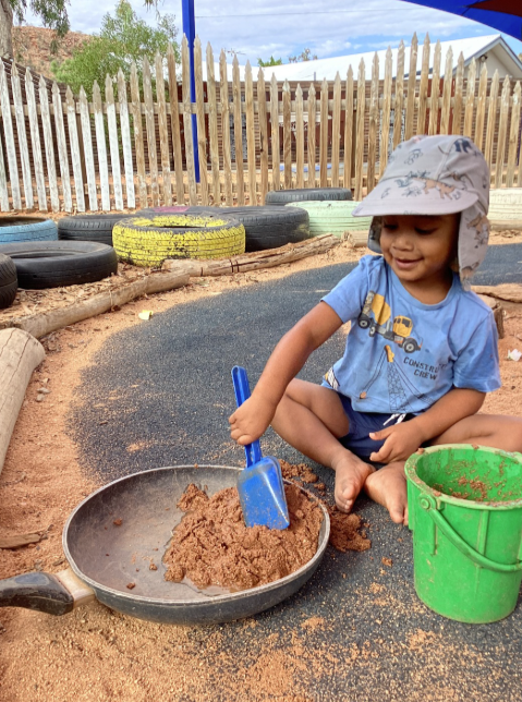 A Child Playing With Sand In a Park β Gap Community Early Learning Centre In The Gap, NT
