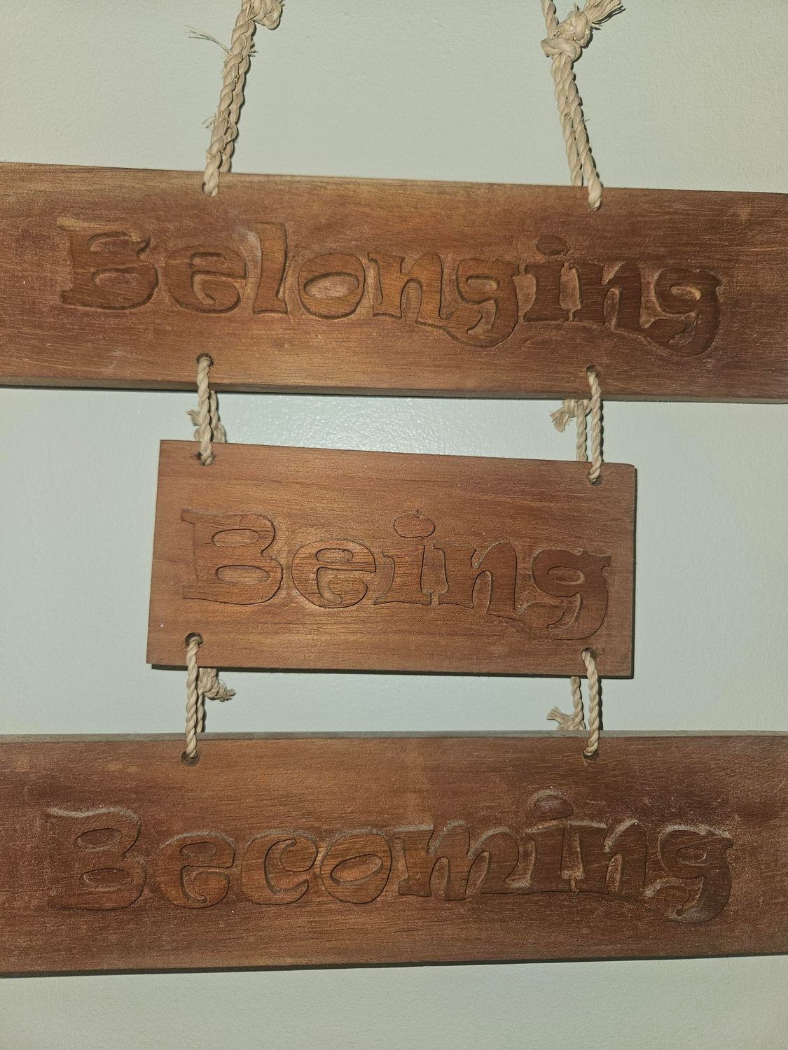 A wooden sign that says belonging hanging on a rope — Gap Community Early Learning Centre In The Gap, NT