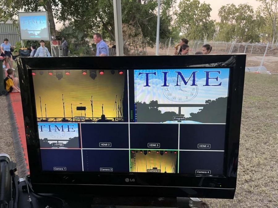 An lg monitor is displaying a scene from the movie time