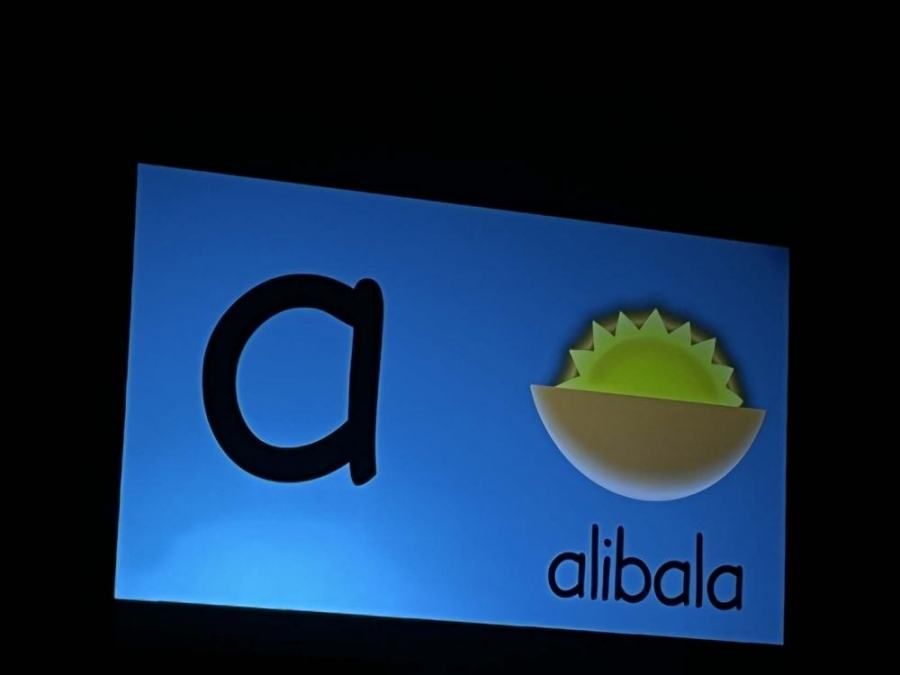 A blue sign that says alibala on it
