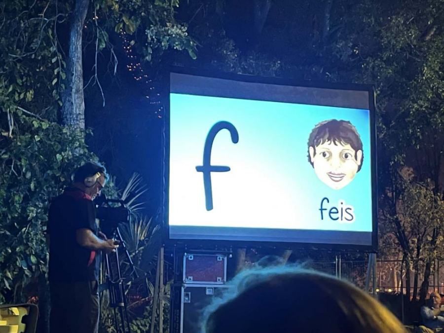 A large screen with the letter f on it
