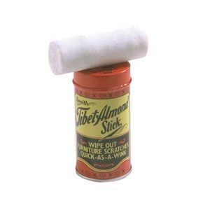 Red and gold Tibet Almond Stick can with white felt roll on top; for removing furniture scratches.