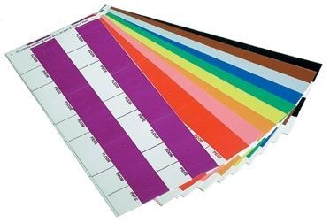 Colored wristbands in a fan, on a white sheet, with blank areas for writing.