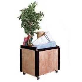 A wooden box on wheels holds a potted plant, fabric, and other items.