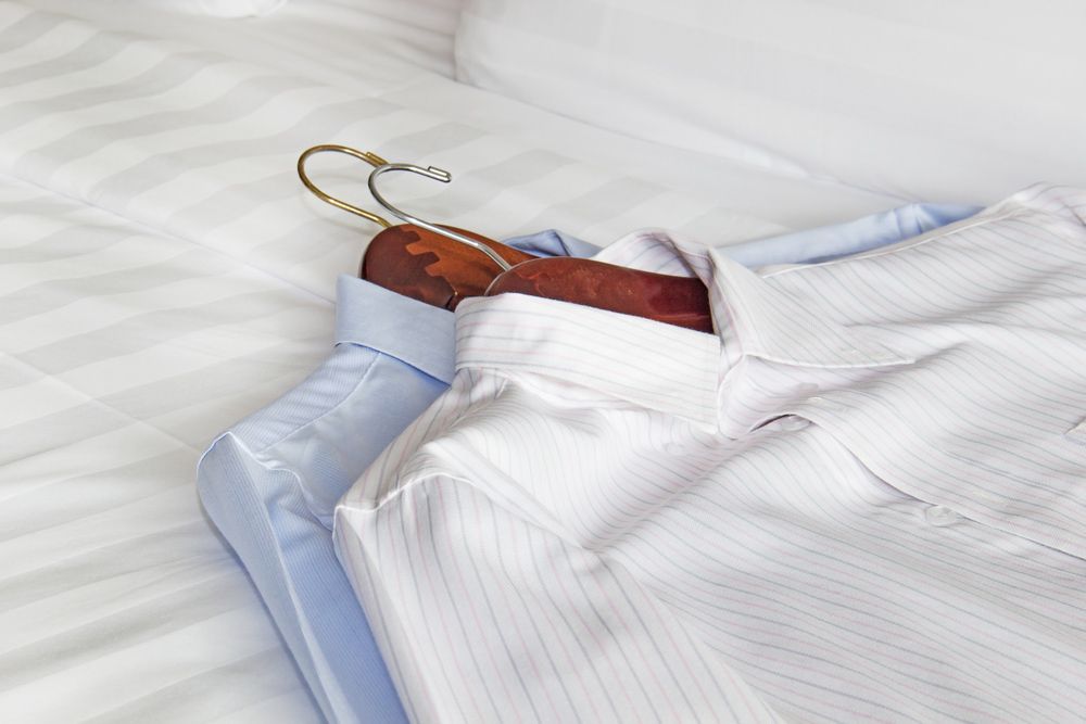 Men's Classic Shirts on The Bed — New Park Suit Hire & Menswear in Hermit Park, QLD