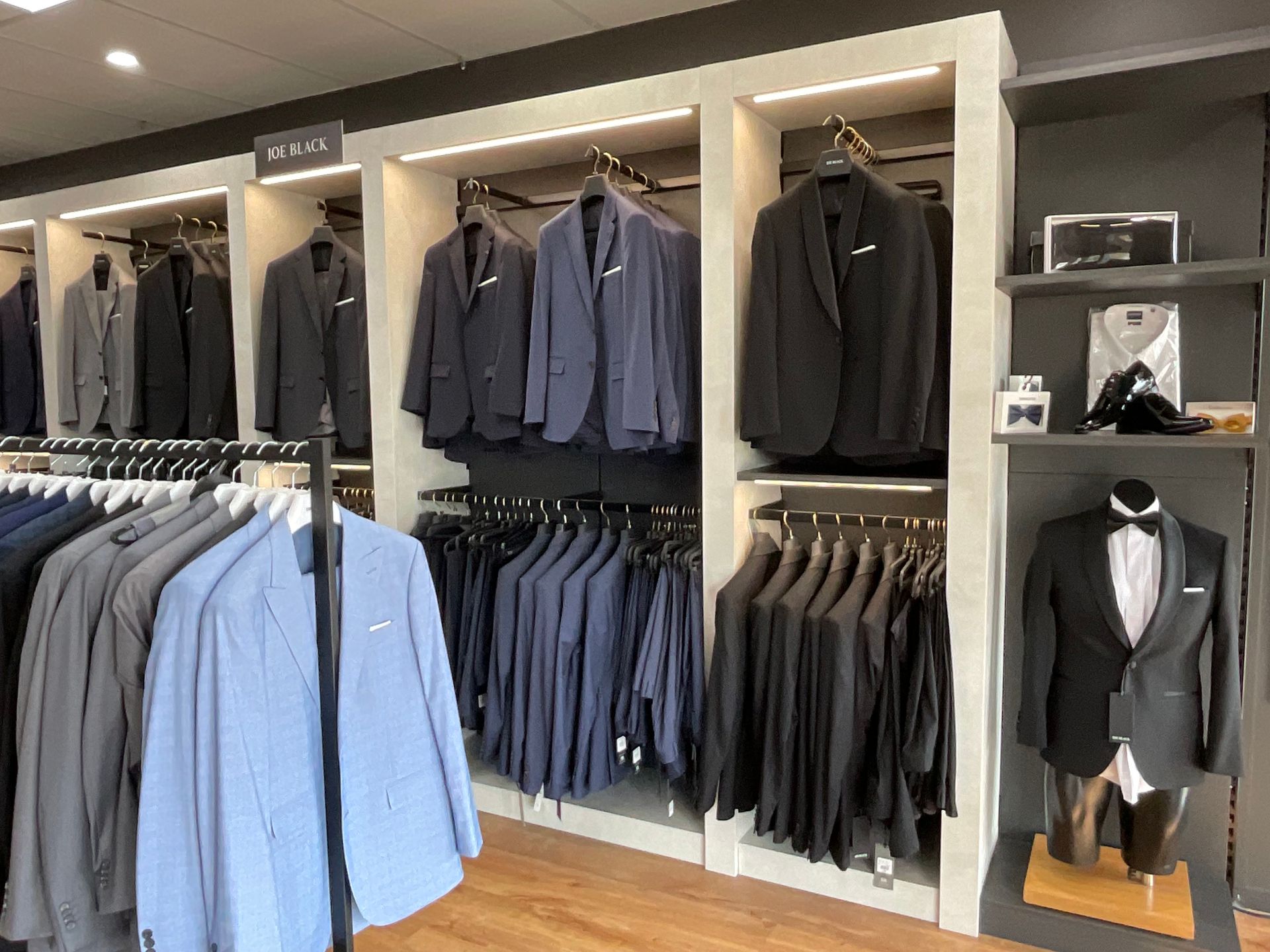 A Display of Suits — New Park Suit Hire & Menswear in Hermit Park, QLD