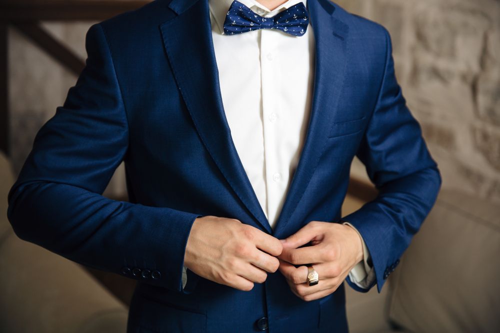 Man in Blue Suit and Bow Tie — New Park Suit Hire & Menswear in Hermit Park, QLD