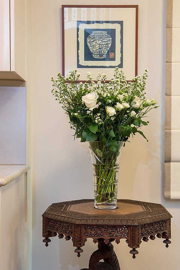 vase of flowers on side table