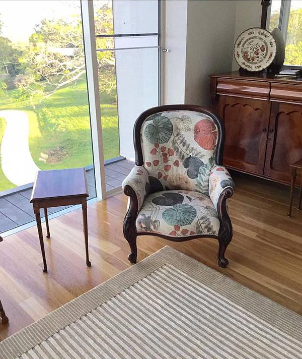 room with armchair and side table