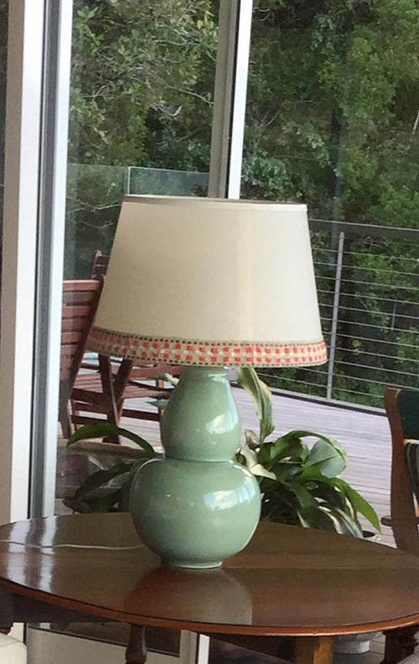 green lamp on side table