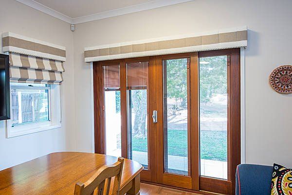 view of doors with wood framing