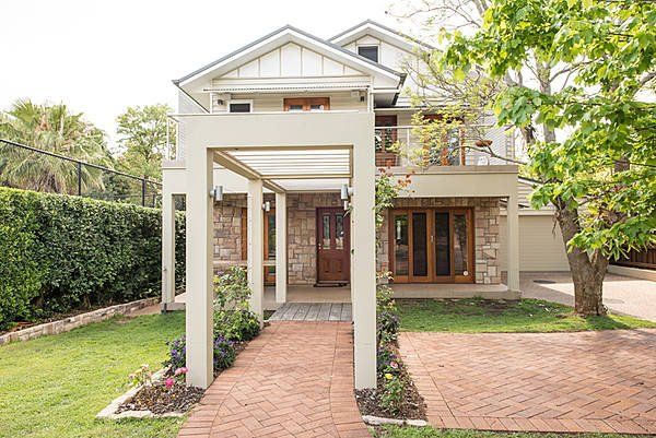 exterior of house with stone pathway