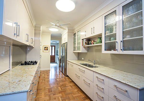 kitchen with white cabinets