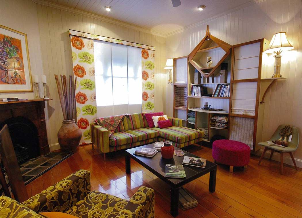 room with patterned window curtains