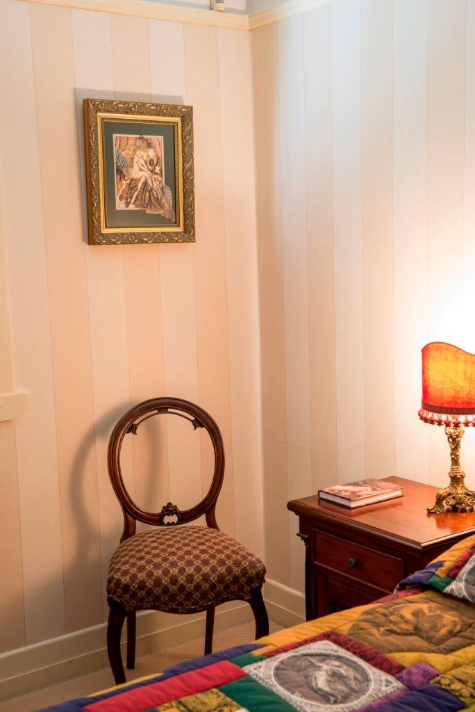 room with striped wallpaper