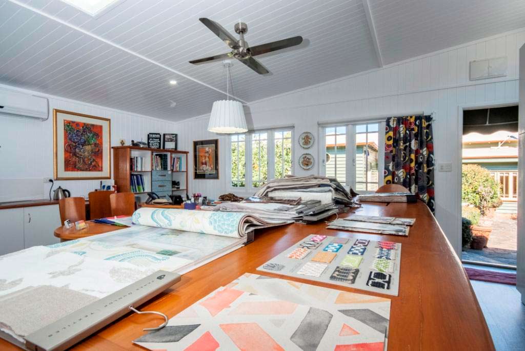 wood desk with materials on it in studio
