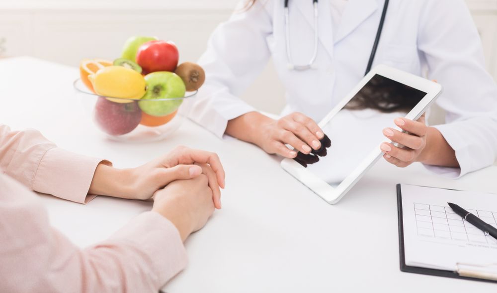 Dietitian Consulting With Patient — Bespoke Longevity and Aesthetic Medicine In Southport, QLD