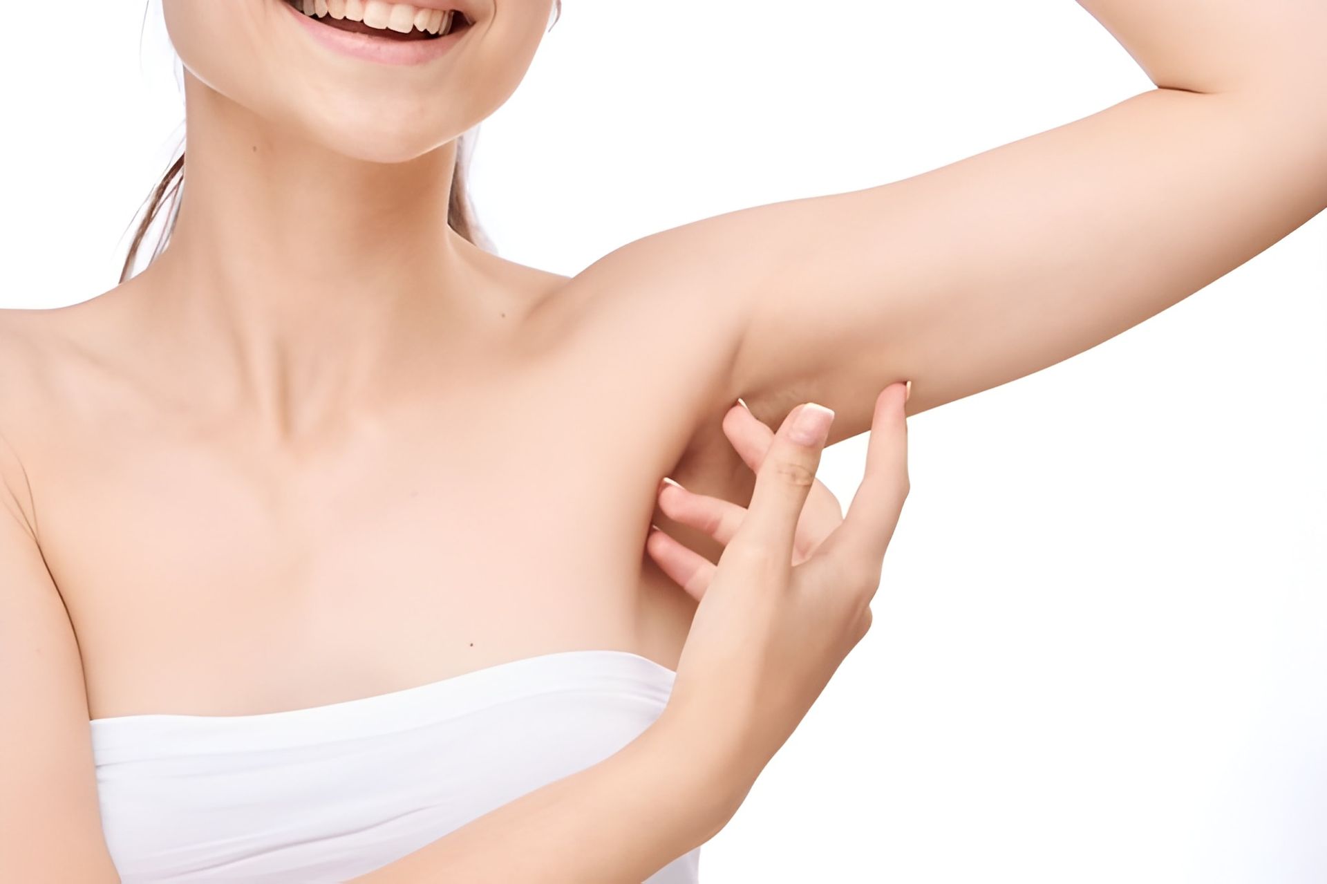 Woman Smiling, Lifting Arm and Touching Armpit — Bespoke Longevity and Aesthetic Medicine In Southport, QLD
