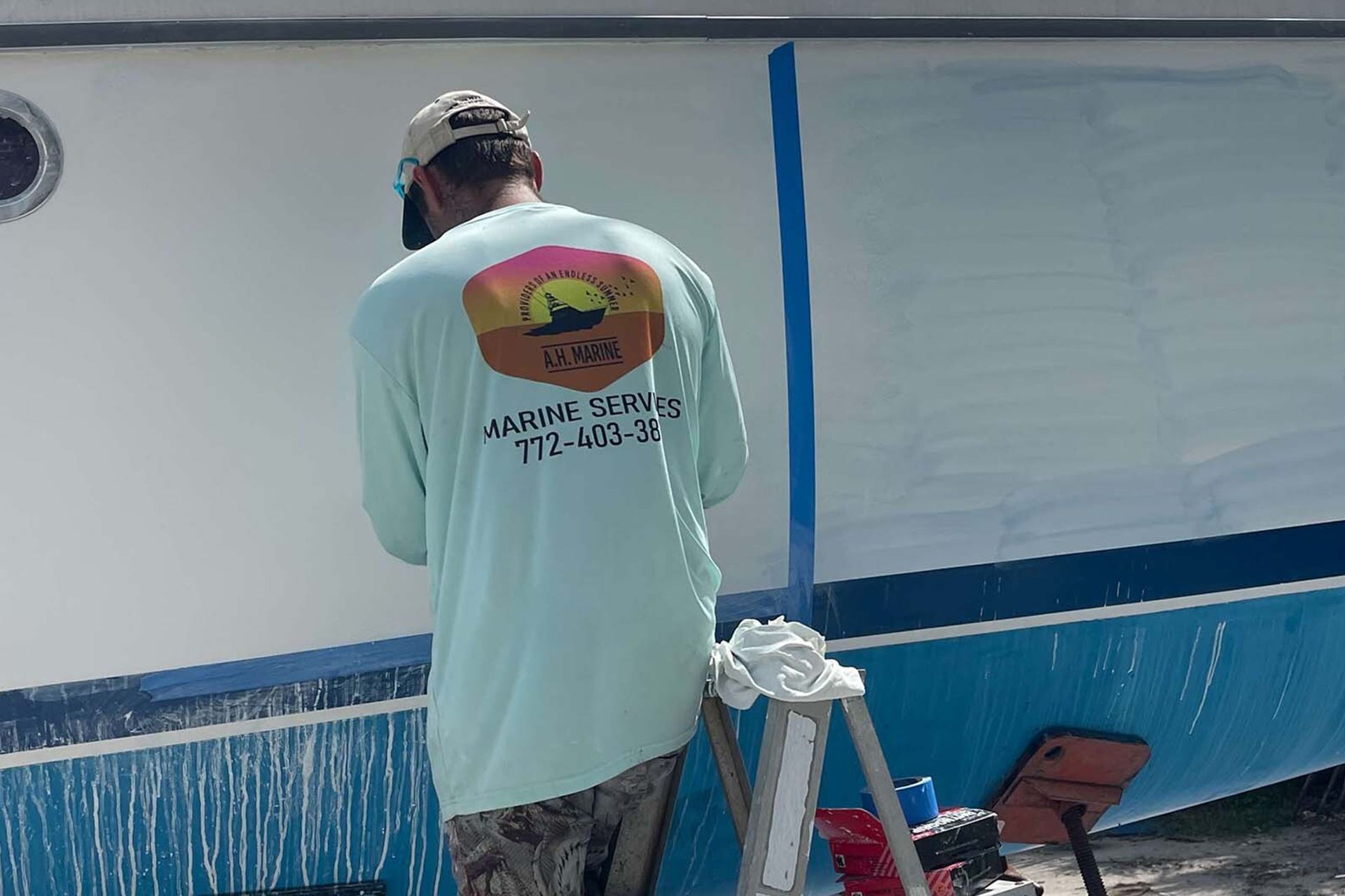 Man Painting the Boat