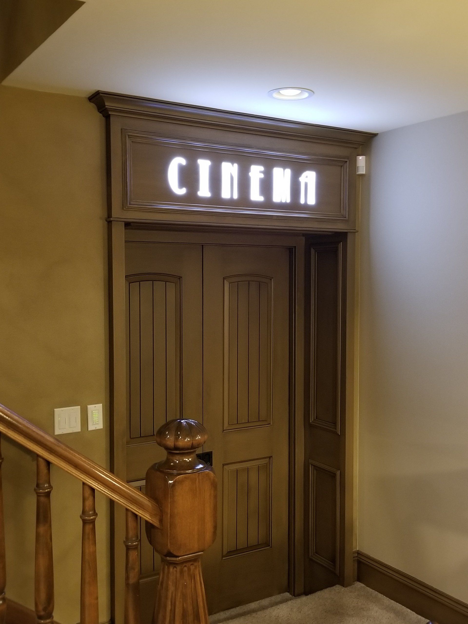 Wooden door to a cinema with 