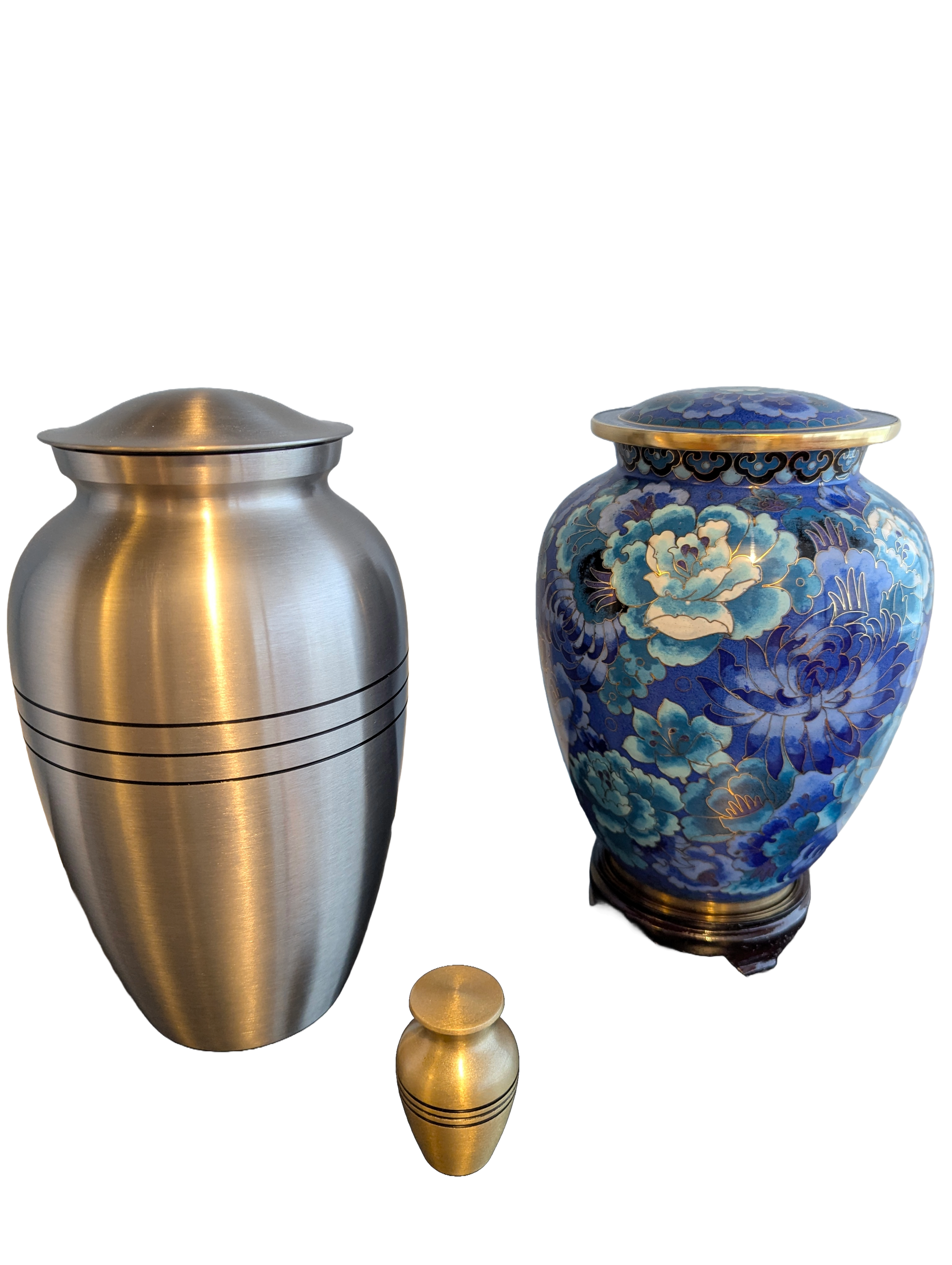 A striped silver urn, miniature brass striped urn, and blue floral urn