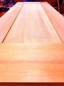 A large piece of wood is sitting on a table