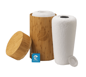 A bamboo container with two paper towels inside of it